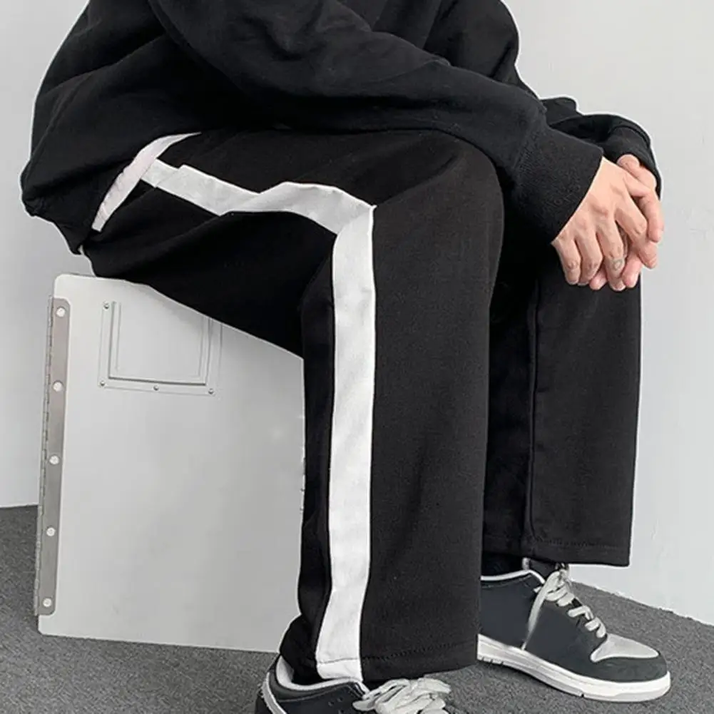 Plus Size Men Pants Spring Fall Color Matching Wide Straight Loose Deep Crotch Sports Striped Casual Men Joggong Sweatpants
Plus Size Men Pants Spring Fall Color Matching Wide Straight Loose Deep Crotch Sports Striped Casual Men Joggong Sweatpants