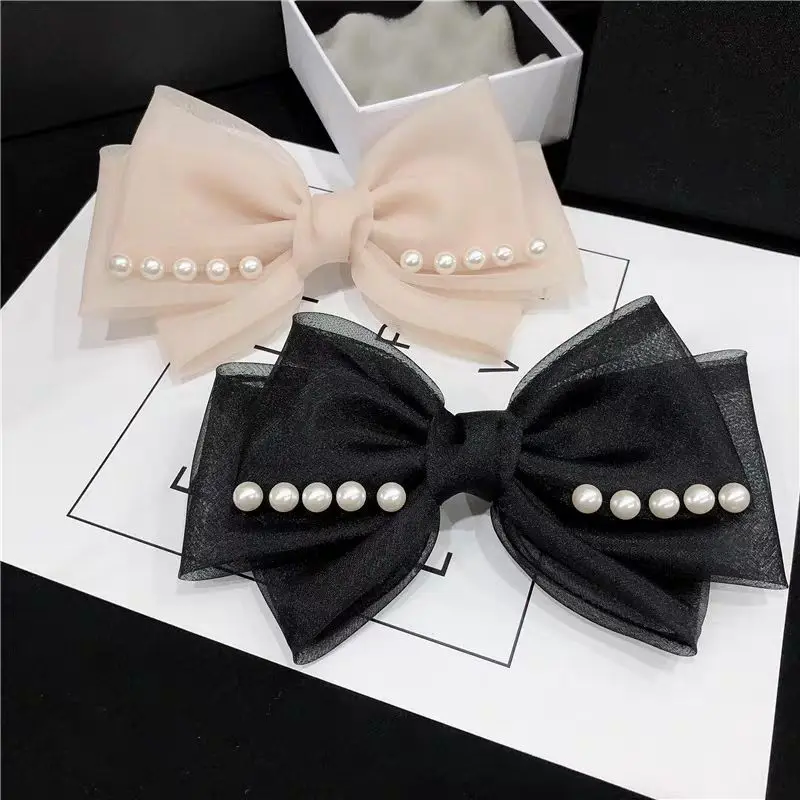 Eugen Yarn Bow New Women's Spring Clip High-end Temperament Hair Clip Pearl Clip Headband
Eugen Yarn Bow New Women's Spring Clip High-end Temperament Hair Clip Pearl Clip Headband