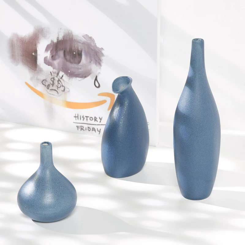 Blue Nordic Mediterranean dried flower vase - elegant ceramic decorative piece for a simple living room, suitable for table deco 
Blue Nordic Mediterranean dried flower vase - elegant ceramic decorative piece for a simple living room, suitable for table deco