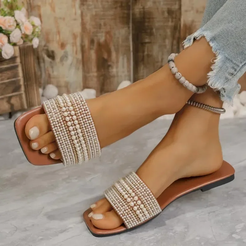 Women Luxury Pearl Slippers 2024 Summer Square Toe Flats Slides Sandals Woman Comfortable Non Slip Beach Flip Flops Big Size 43
Women Luxury Pearl Slippers 2024 Summer Square Toe Flats Slides Sandals Woman Comfortable Non Slip Beach Flip Flops Big Size 43