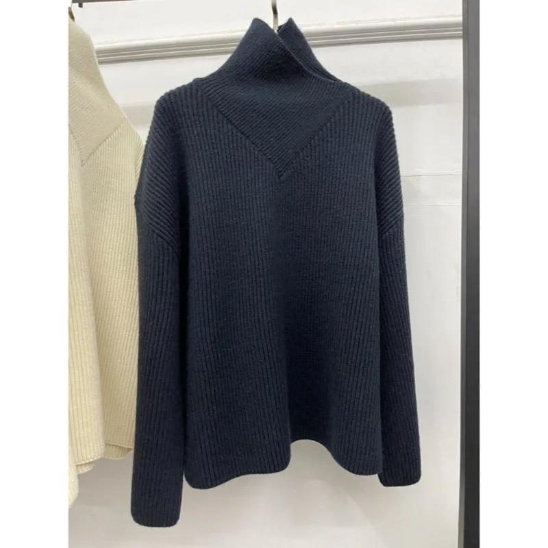 Свободный женский свитер с высоким воротником в рубчик, осень-зима 2025 г.
Свободный женский свитер с высоким воротником в рубчик, осень-зима 2025 г.