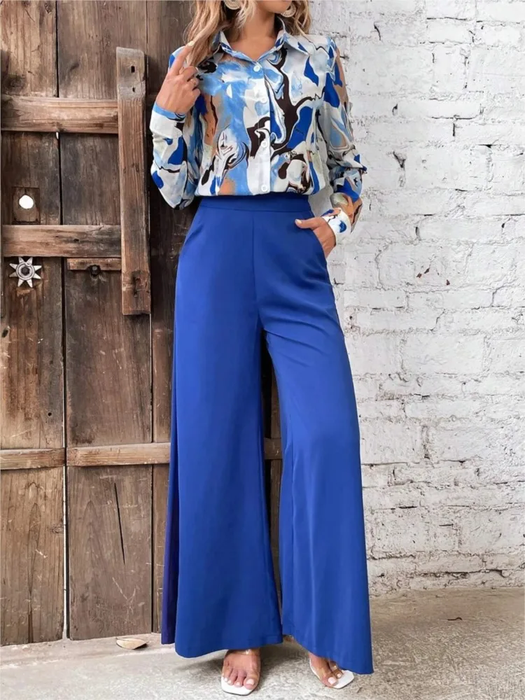 Spring Women Elegant Two Piece Sets Autumn Fashion Lapel Single Breasted Long Sleeved Print Shirt Solid Color Wide Leg Pants Set
Spring Women Elegant Two Piece Sets Autumn Fashion Lapel Single Breasted Long Sleeved Print Shirt Solid Color Wide Leg Pants Set