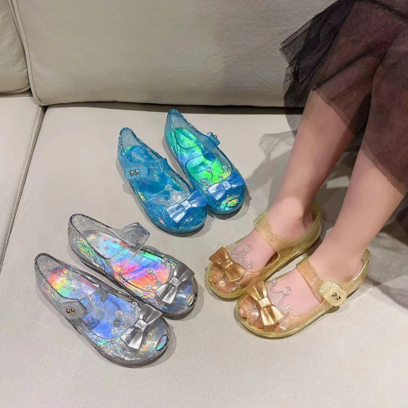 Детские сандалии, прозрачные туфли из ПВХ с бантом и короной Melissa, модная летняя обувь для детей, нескользящая мягкая подошва, синяя, серебристая, размер 24-32
Детские сандалии, прозрачные туфли из ПВХ с бантом и короной Melissa, модная летняя обувь для детей, нескользящая мягкая подошва, синяя, серебристая, размер 24-32