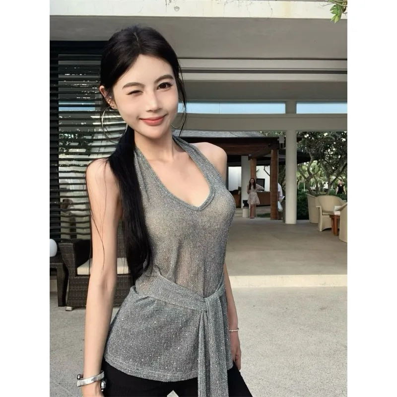 Women's Glitter Halter Neck Sleeveless Top with Waist Tie Detail
Women's Glitter Halter Neck Sleeveless Top with Waist Tie Detail