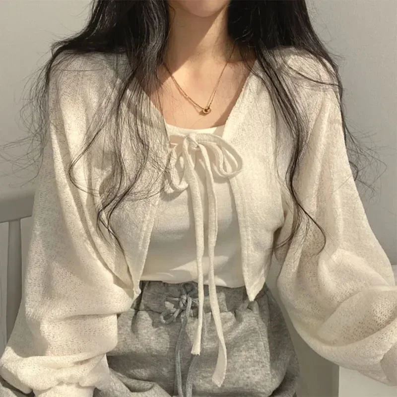 White Knitted Cardigan Women Summer Thin Sunscreen Lace-Up Knitwear Tops Female Korean Style Lantern Sleeve Short Coat
White Knitted Cardigan Women Summer Thin Sunscreen Lace-Up Knitwear Tops Female Korean Style Lantern Sleeve Short Coat