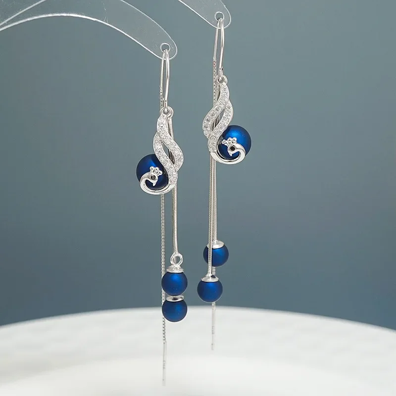 China's fashion S925 sterling silver Korean style earrings female long tassel retro earrings pendant temperament phoenix women
China's fashion S925 sterling silver Korean style earrings female long tassel retro earrings pendant temperament phoenix women