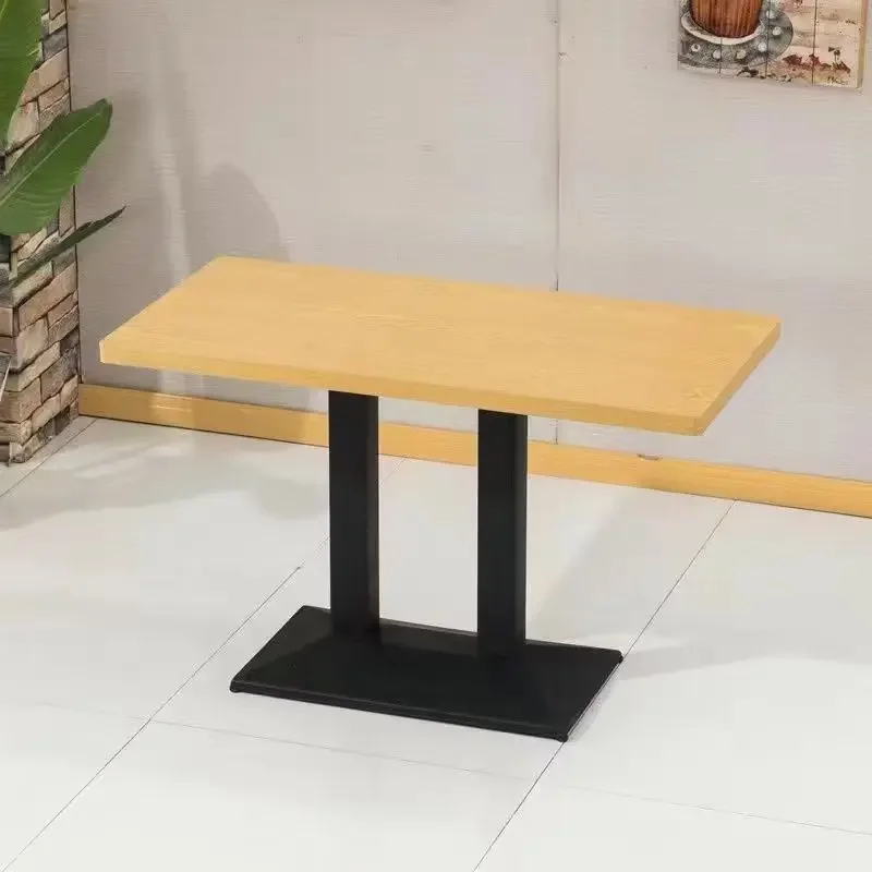 Modern wooden top dining table with metal base, suitable for family restaurant cafes
Modern wooden top dining table with metal base, suitable for family restaurant cafes