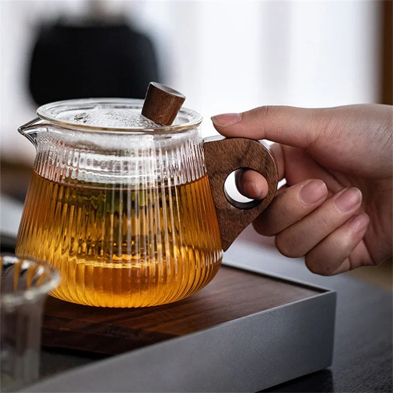 Japanese Heat Resistant Vertical Stripe Glass Tea Pot Wood Handle Teapot Kung Fu Tea Set Puer Kettle Coffee Glass Pot Teaware
Japanese Heat Resistant Vertical Stripe Glass Tea Pot Wood Handle Teapot Kung Fu Tea Set Puer Kettle Coffee Glass Pot Teaware