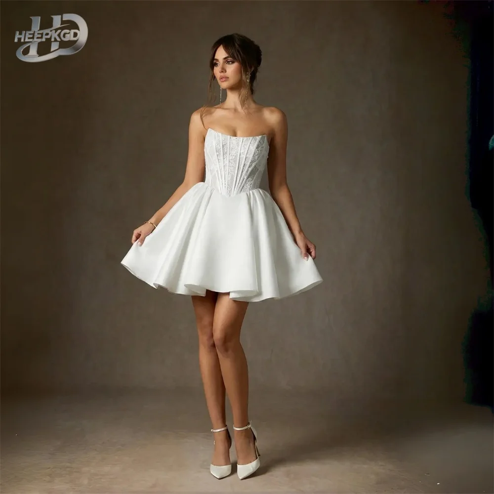 Cute Short White Ball Gown Wedding Dress Strapless Boning Lace Satin Mini 2026 New Bridal Gowns For Wedding Wholesale
Cute Short White Ball Gown Wedding Dress Strapless Boning Lace Satin Mini 2026 New Bridal Gowns For Wedding Wholesale