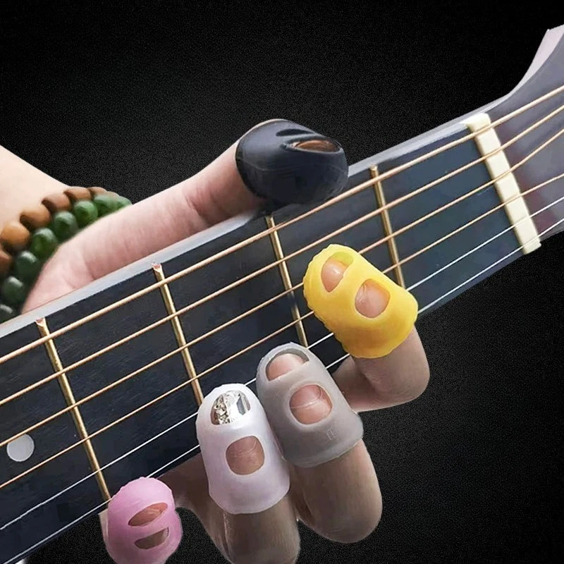 Guitar colored silicone soft finger cover non-slip breathable finger cover ukulele left hand anti-pain protection finger cover
Guitar colored silicone soft finger cover non-slip breathable finger cover ukulele left hand anti-pain protection finger cover
