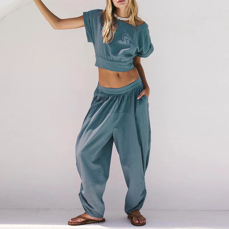 Sexy Backless Loose Beach Suit Casual Street Pleated Pocket Outfit Female O Neck Short Sleeve Top & Wide Leg Pants Two Piece Set
Sexy Backless Loose Beach Suit Casual Street Pleated Pocket Outfit Female O Neck Short Sleeve Top & Wide Leg Pants Two Piece Set
