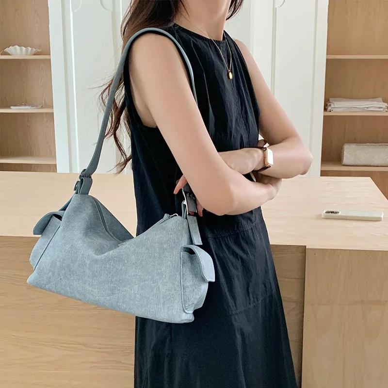 Women Leather Tote Bags Solid Large Capacity Commute Shoulder Packs Female Casual Versatile Denim Zipper Underarm Bag Messenger
Women Leather Tote Bags Solid Large Capacity Commute Shoulder Packs Female Casual Versatile Denim Zipper Underarm Bag Messenger