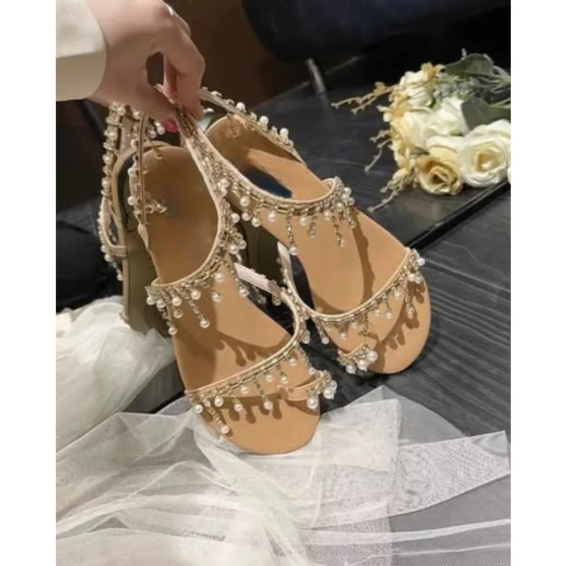 Bohemian Pearl Sandals Women's 2025 Summer Rhinestone Pullover Flat Outdoor Buckle New Beach Women's Shoes Luxury Designer
Bohemian Pearl Sandals Women's 2025 Summer Rhinestone Pullover Flat Outdoor Buckle New Beach Women's Shoes Luxury Designer