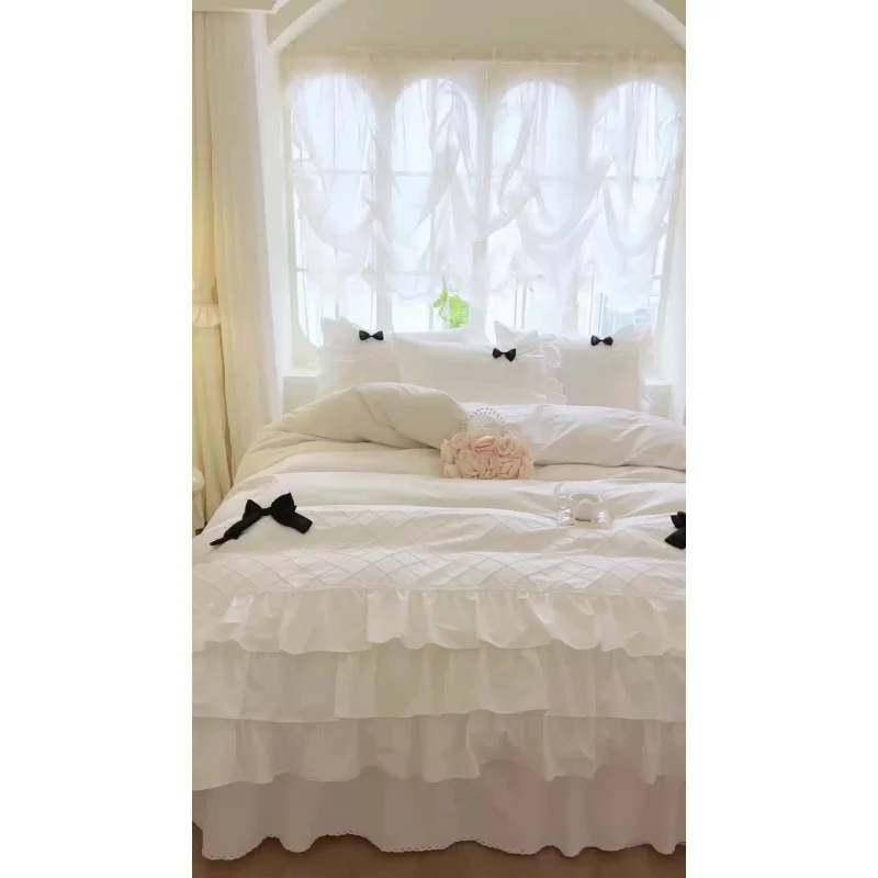 cotton four-piece princess skirt bedding set with bow detail
cotton four-piece princess skirt bedding set with bow detail