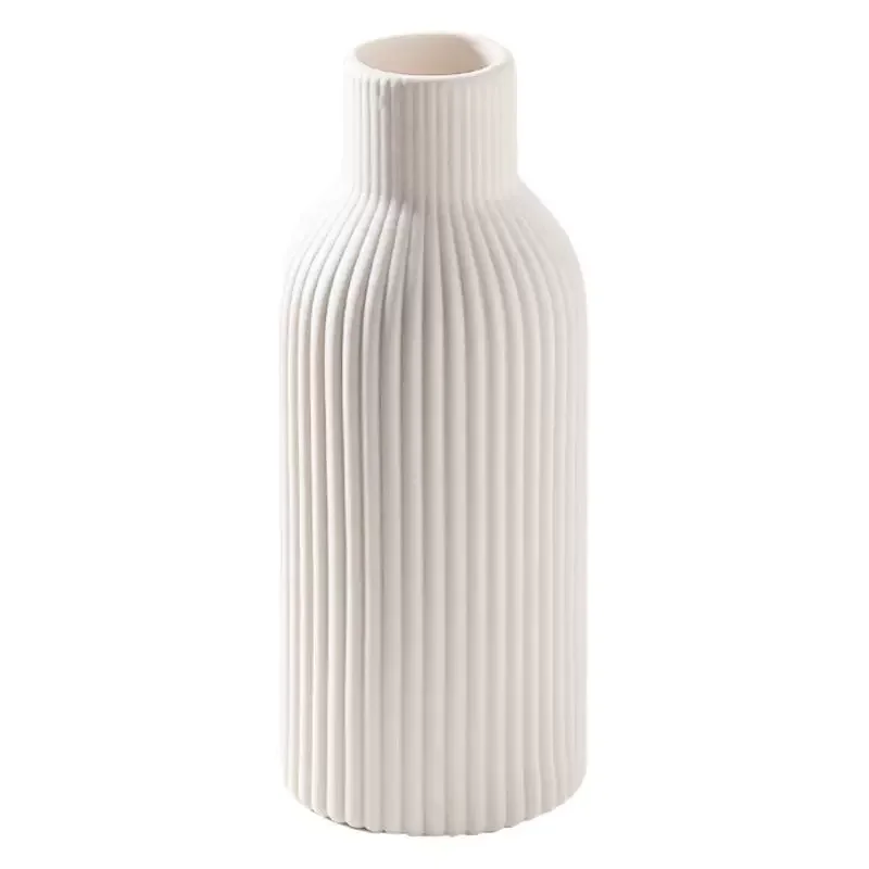 Modern minimalist creative ceramic white vase, home living room TV cabinet decorative ornament
Modern minimalist creative ceramic white vase, home living room TV cabinet decorative ornament