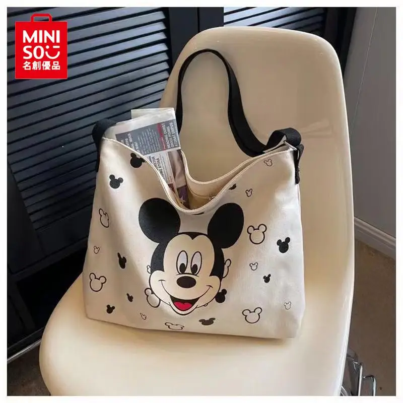 MINISO canvas bag women's crossbody bag autumn and winter new style Japanese large capacity cartoon printed student shoulder bag
MINISO canvas bag women's crossbody bag autumn and winter new style Japanese large capacity cartoon printed student shoulder bag