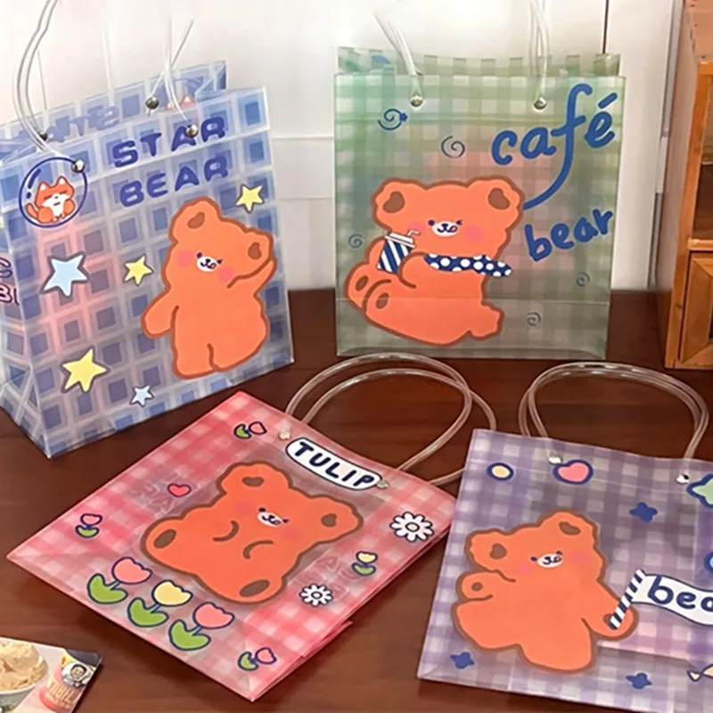 PVC Cute Cartoon Bear Gift Bags with Handle Plastic Tote Bag Gift Wrap Bag for Wrapping Holiday Gifts Shopping Birthday Supplies
PVC Cute Cartoon Bear Gift Bags with Handle Plastic Tote Bag Gift Wrap Bag for Wrapping Holiday Gifts Shopping Birthday Supplies