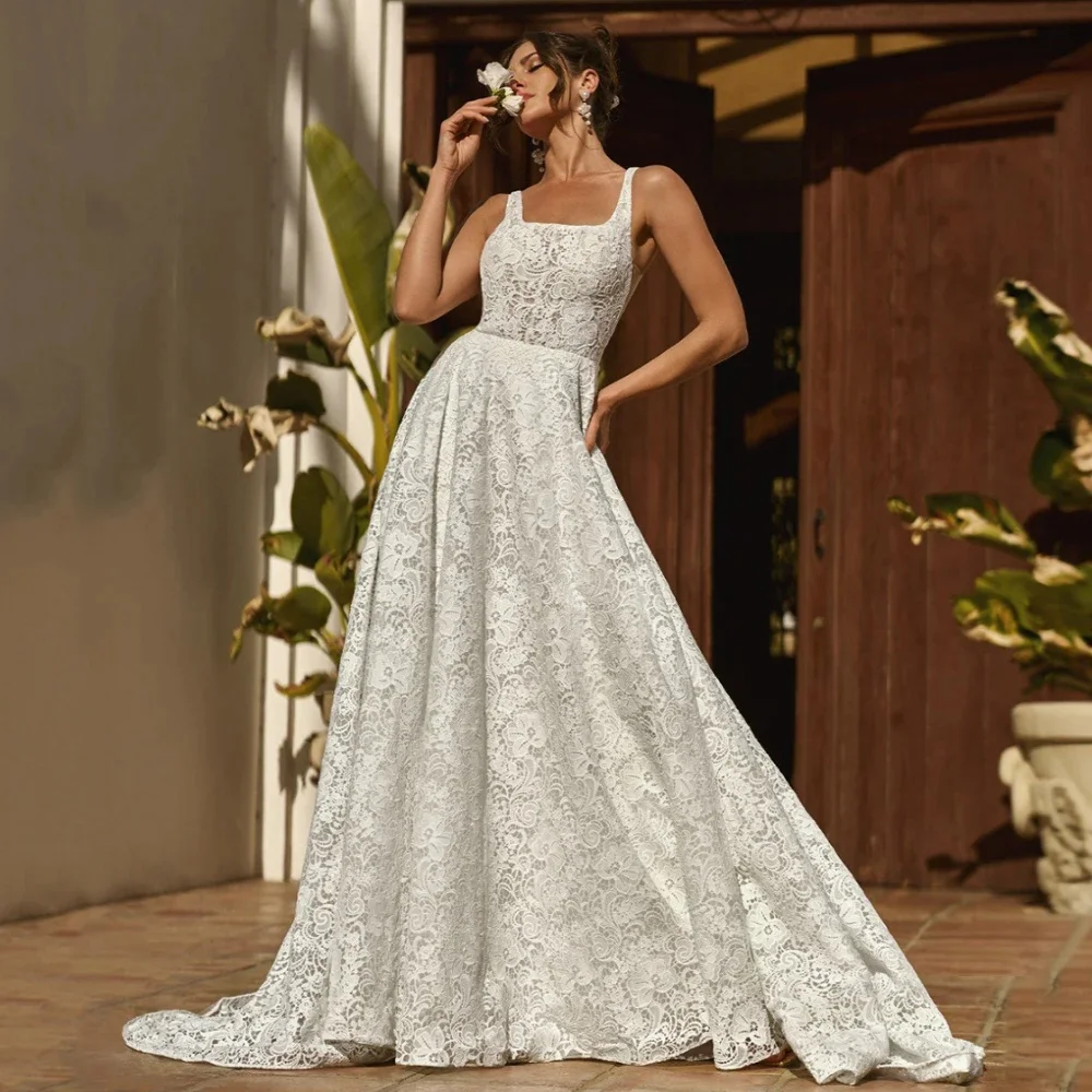 Exquisite Lace Vestidos De Novia Sleeveless Square Collar Open Back Bow Wedding Dresses Customized Appliques Vestido De Noiva
Exquisite Lace Vestidos De Novia Sleeveless Square Collar Open Back Bow Wedding Dresses Customized Appliques Vestido De Noiva