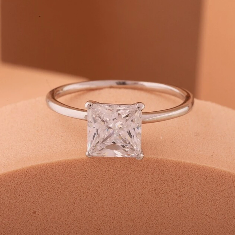 Seasons of Shine 1ct Princess Cut Moissanite Engagement Ring for Women 18K White Gold Plated S925 Sterling Silver Wedding Ring
Seasons of Shine 1ct Princess Cut Moissanite Engagement Ring for Women 18K White Gold Plated S925 Sterling Silver Wedding Ring