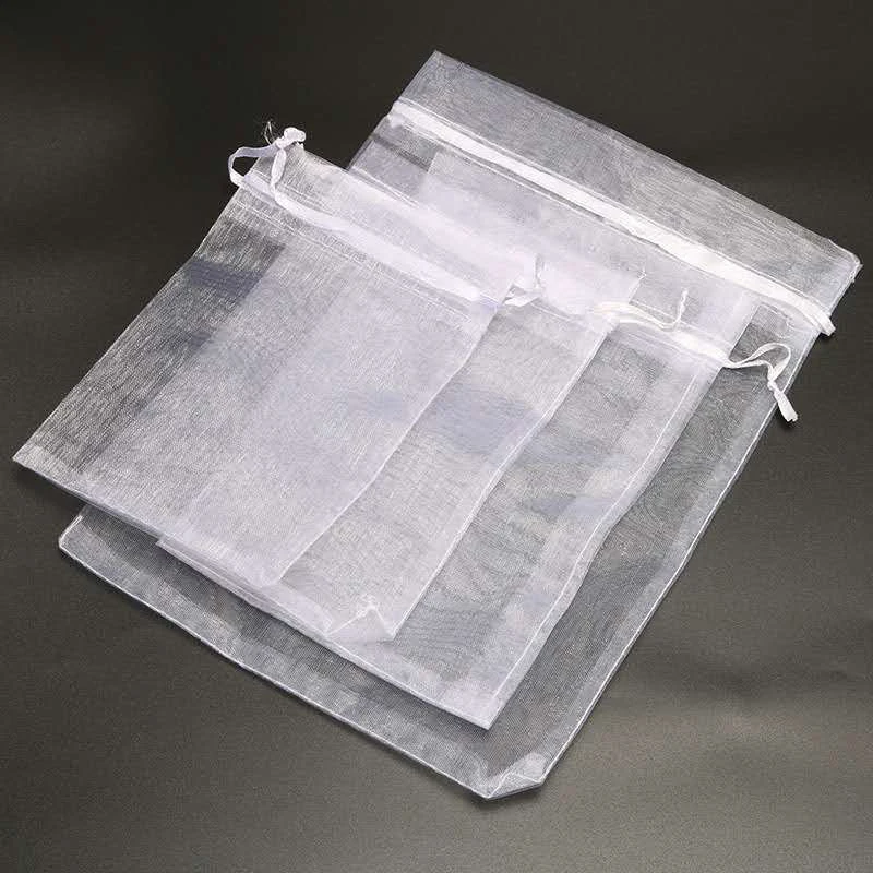 100pcs Organza Bags Packaging Bags White Drawstring Small Pouches Jewelry Package Bags Candy Gift Packaging Bags Bulk Wholesale
100pcs Organza Bags Packaging Bags White Drawstring Small Pouches Jewelry Package Bags Candy Gift Packaging Bags Bulk Wholesale
