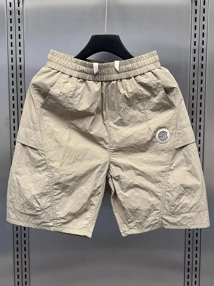 Мужская летняя новая дышащая пляжная одежда с пятью точками Qui Dry, свободная рабочая одежда, модная пляжная одежда свободного покроя
Мужская летняя новая дышащая пляжная одежда с пятью точками Qui Dry, свободная рабочая одежда, модная пляжная одежда свободного покроя