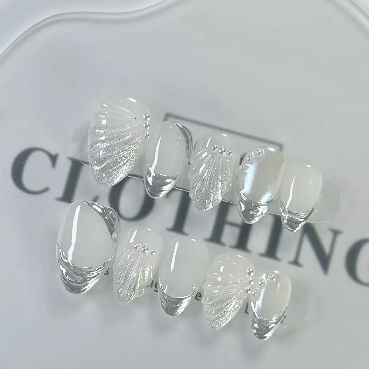 10pcs Nail Tips Almond Short Reusable Fake Nails Withi 3D French Style Pearl Shell Pattern For Four Seasons Nail Art Decorations
10pcs Nail Tips Almond Short Reusable Fake Nails Withi 3D French Style Pearl Shell Pattern For Four Seasons Nail Art Decorations