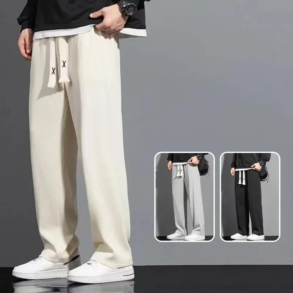 Men Casual Pants Solid Color Drawstring Elastic Waist Loose Fit Long Trousers Straight Wide Leg Pants Casual Sports Long Pants
Men Casual Pants Solid Color Drawstring Elastic Waist Loose Fit Long Trousers Straight Wide Leg Pants Casual Sports Long Pants