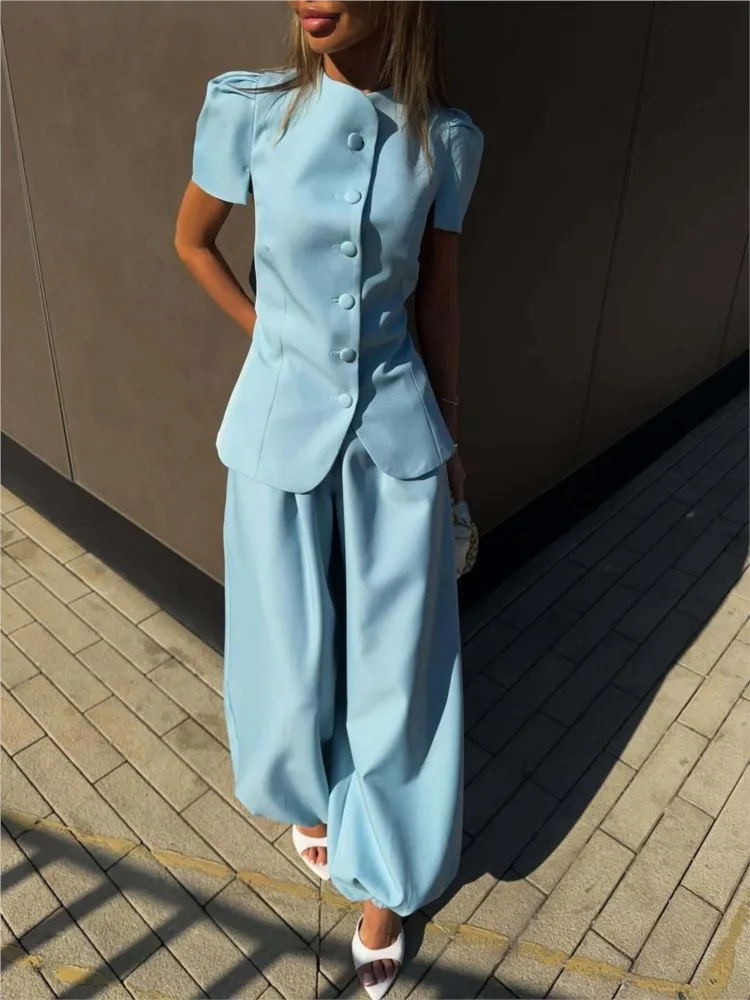 Elegant Short-sleeved Top And Trousers Suit 2026 Women Solid Color Single-breasted O-neck Waisted Top And Bloomers Two-piece Set
Elegant Short-sleeved Top And Trousers Suit 2026 Women Solid Color Single-breasted O-neck Waisted Top And Bloomers Two-piece Set