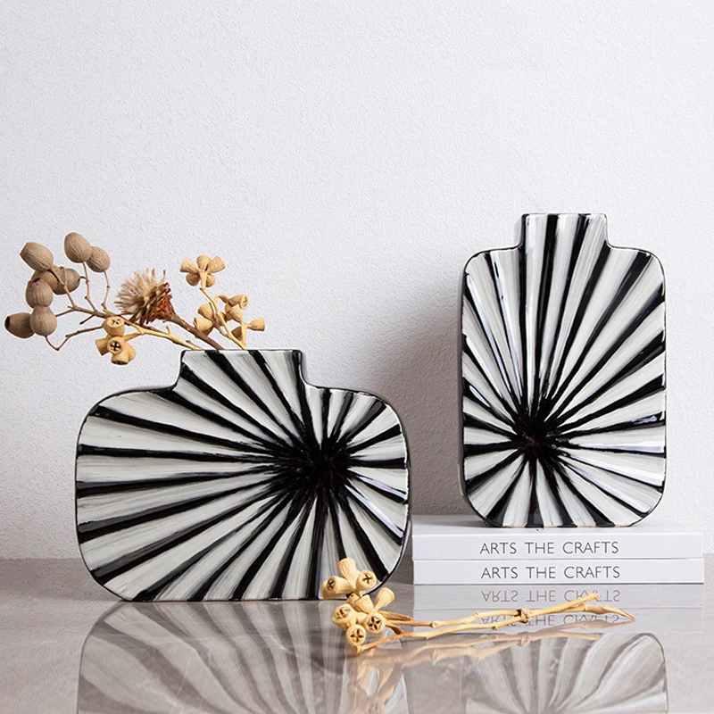 Creative Minimalist Ceramic Black and White Stripes Divergent Vase Fashion Home Hotel Flower Arrangement Handicraft Ornaments
Creative Minimalist Ceramic Black and White Stripes Divergent Vase Fashion Home Hotel Flower Arrangement Handicraft Ornaments