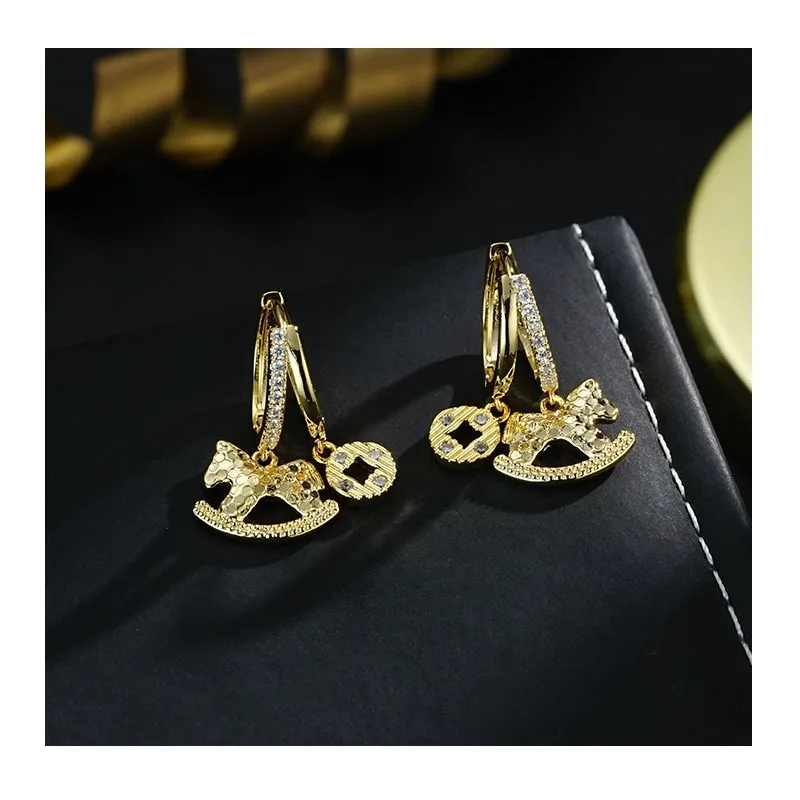 New Popular Gold Broken Ice Pony Coin Natal Year Cold Wind Simple Earrings Earrings
New Popular Gold Broken Ice Pony Coin Natal Year Cold Wind Simple Earrings Earrings