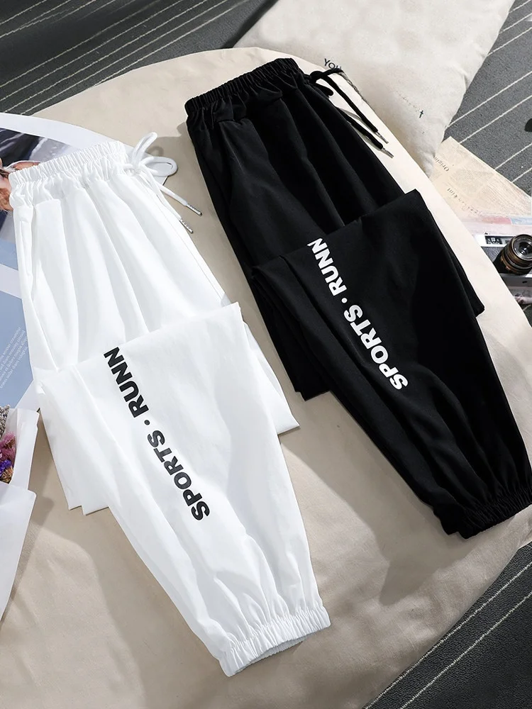 Ice Silk Qui Dry Sports Pants Women's Spring Summer Thin Lettered Cuffed Nine Points Harem Casual Pants High Waist Loose Fit
Ice Silk Qui Dry Sports Pants Women's Spring Summer Thin Lettered Cuffed Nine Points Harem Casual Pants High Waist Loose Fit