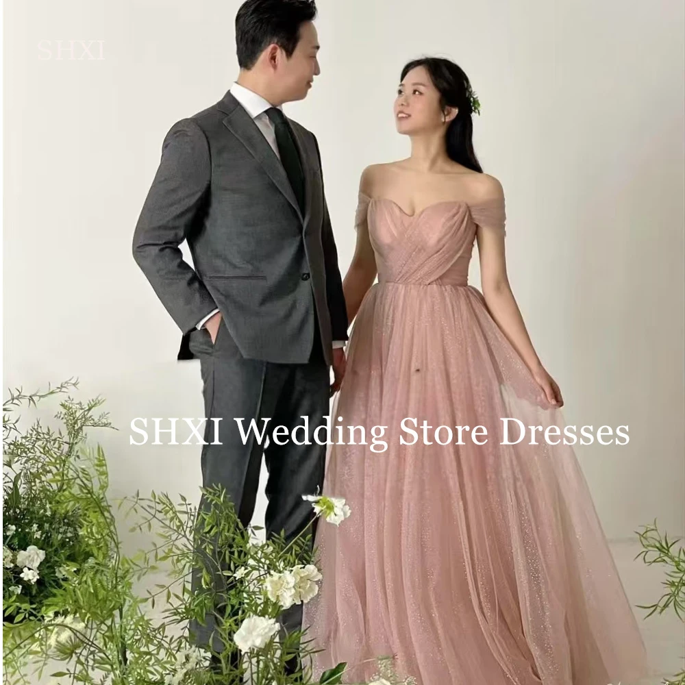 SHXI Elegant Blush Pink Korea Evening Dresses Sparkly Shiny Tulle Wedding Photo Shoot Dresses Off Shoulder Bride Gown Customizen
SHXI Elegant Blush Pink Korea Evening Dresses Sparkly Shiny Tulle Wedding Photo Shoot Dresses Off Shoulder Bride Gown Customizen