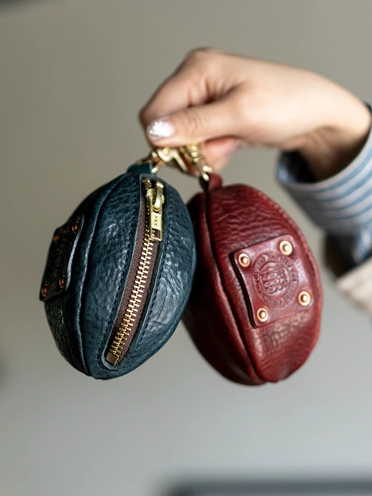 designer handmade high-quality padded first layer cowhide men's women's small coin purse Vintage genuine leather headset key bag
designer handmade high-quality padded first layer cowhide men's women's small coin purse Vintage genuine leather headset key bag