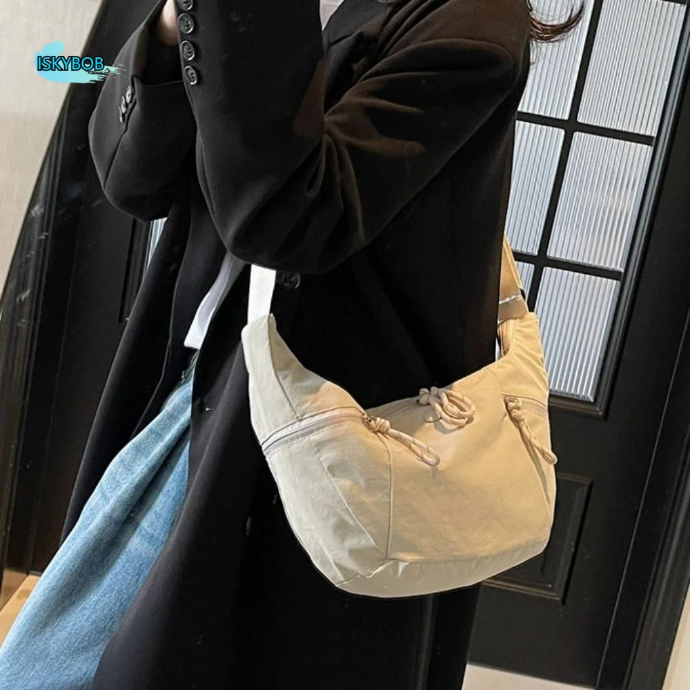 Large Capacity Nylon Dumpling Bag Japanese Style Multiple Pockets Casual Crossbody Bag Solid Color Simple Sports Shoulder Bag
Large Capacity Nylon Dumpling Bag Japanese Style Multiple Pockets Casual Crossbody Bag Solid Color Simple Sports Shoulder Bag