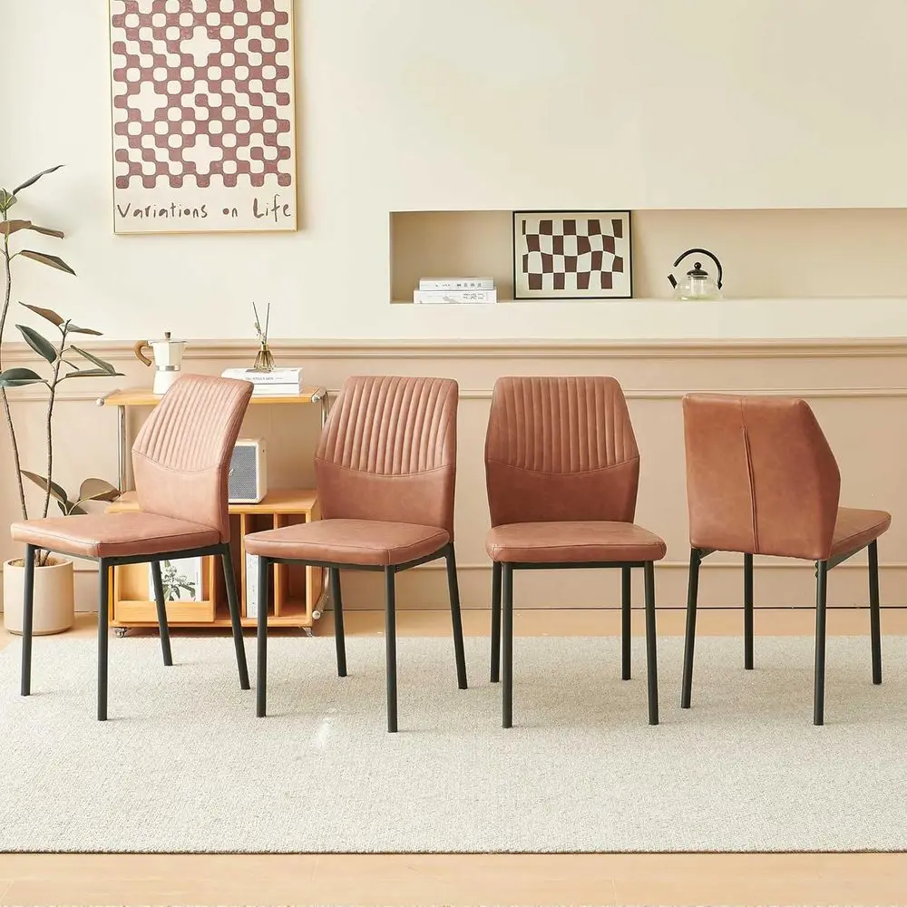 Set of 4 Brown Faux Leather Dining Chairs with Black Metal Legs and Padded Seats for Kitchen, Living Room, or Restaurant Use
Set of 4 Brown Faux Leather Dining Chairs with Black Metal Legs and Padded Seats for Kitchen, Living Room, or Restaurant Use
