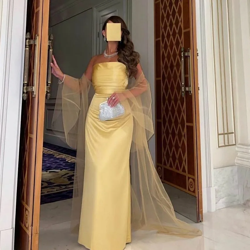 2023 Latest Yellow Satin Evening Dresses Mermaid Starpless Tulle Capes Prom Dress Saudi Arabic Dubai Women Formal Party Gowns
2023 Latest Yellow Satin Evening Dresses Mermaid Starpless Tulle Capes Prom Dress Saudi Arabic Dubai Women Formal Party Gowns