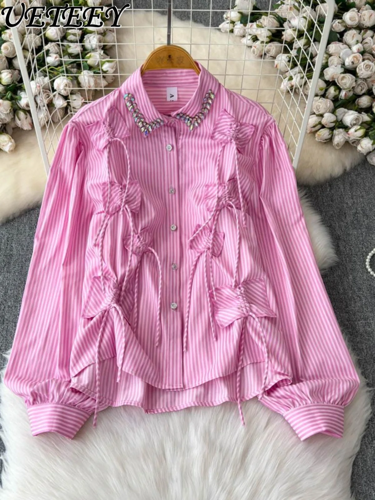 Drawstring Pleated Tassel Design Lapel Single-breasted Long-sleeve Shirt Women Spring New Loose Sweet Striped Blouse Top Lady
Drawstring Pleated Tassel Design Lapel Single-breasted Long-sleeve Shirt Women Spring New Loose Sweet Striped Blouse Top Lady