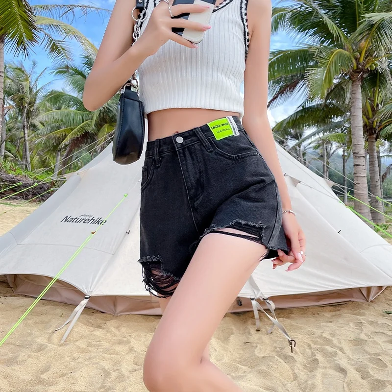 Женские джинсовые брюки свободного кроя с высокой талией, лето 2024, новые шорты трапециевидной формы большого размера, рваный дизайн, утягивающие широкие брюки
Женские джинсовые брюки свободного кроя с высокой талией, лето 2024, новые шорты трапециевидной формы большого размера, рваный дизайн, утягивающие широкие брюки