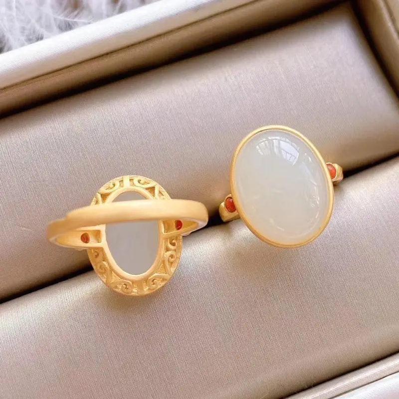 Sterling silver gilt inlaid Hetian jade & Nanhong ring temperament women's new model
Sterling silver gilt inlaid Hetian jade & Nanhong ring temperament women's new model