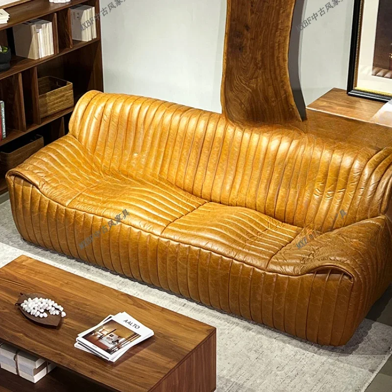 Wave sofa oil wax first layer leather sofa classic medieval living room small apartment
Wave sofa oil wax first layer leather sofa classic medieval living room small apartment