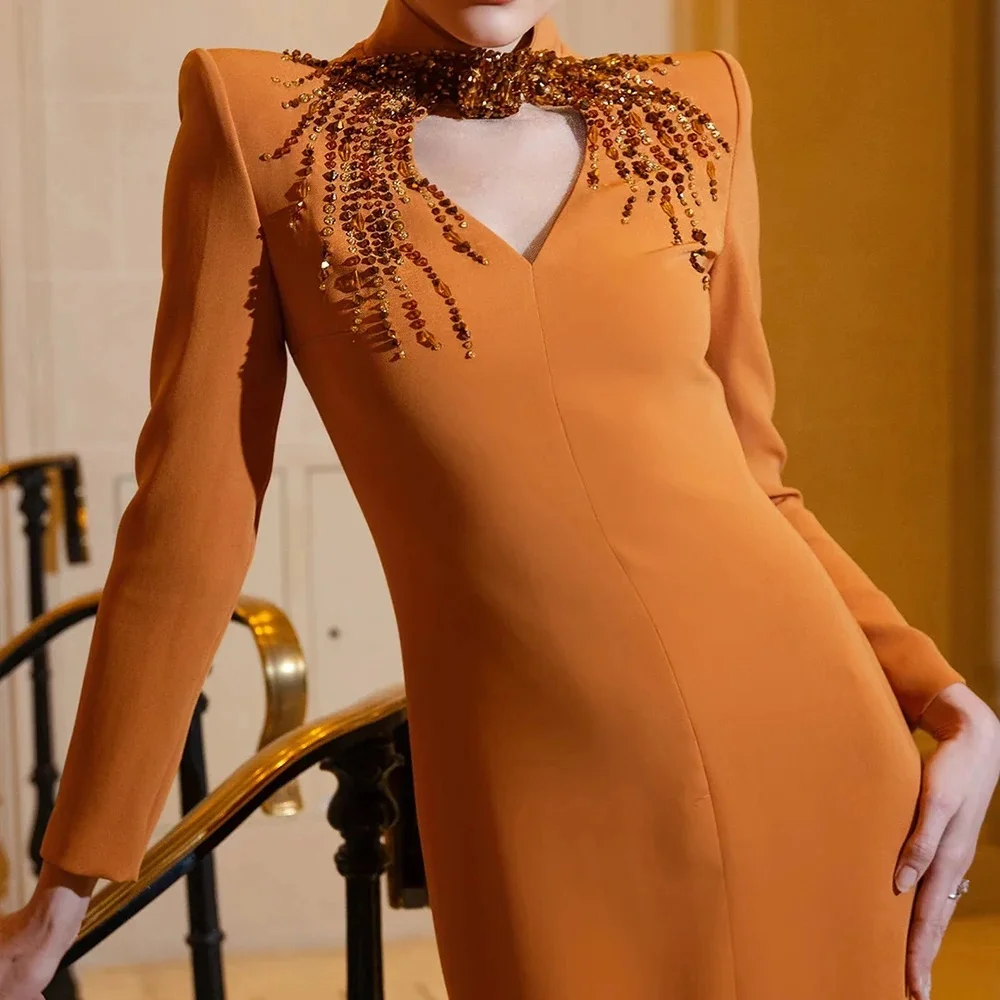 V-neck long sleeve slimming floor-length gown with fitted waist to gently shape body, sleek straight skirt for minimalist charm.
V-neck long sleeve slimming floor-length gown with fitted waist to gently shape body, sleek straight skirt for minimalist charm.