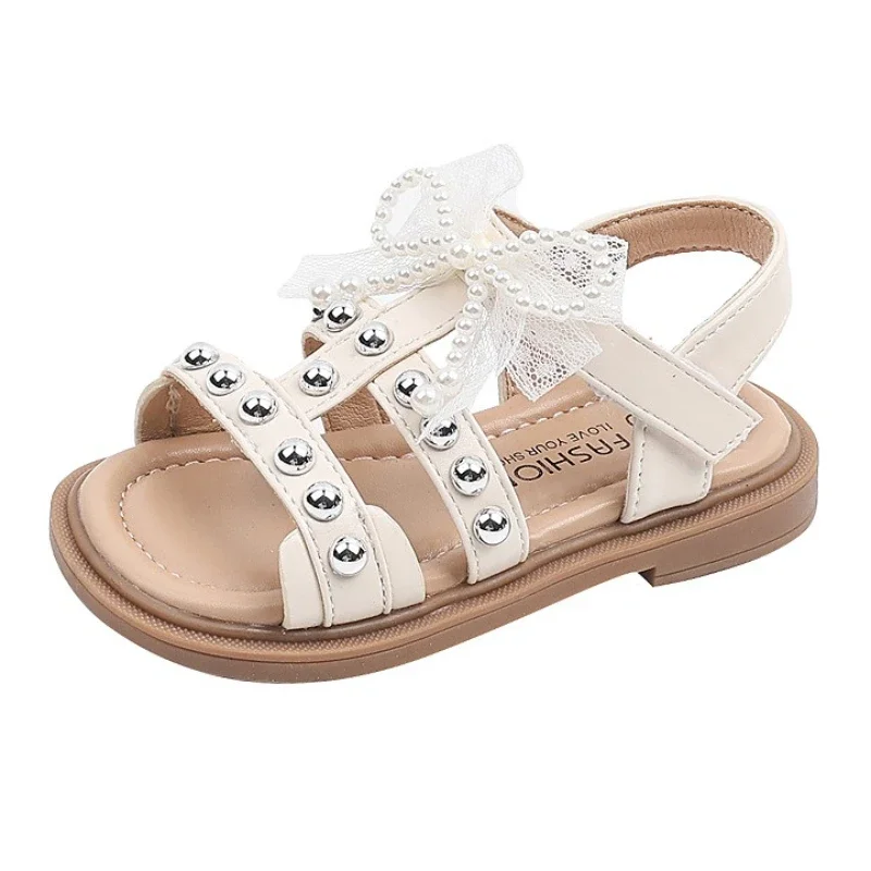 2025 Summer Kids' Roman Sandals Pearl Bow Decor Girls' Princess Sandals Anti-Slip Soft Flat Sole Leisure Toddlers' Beach Shoes
2025 Summer Kids' Roman Sandals Pearl Bow Decor Girls' Princess Sandals Anti-Slip Soft Flat Sole Leisure Toddlers' Beach Shoes