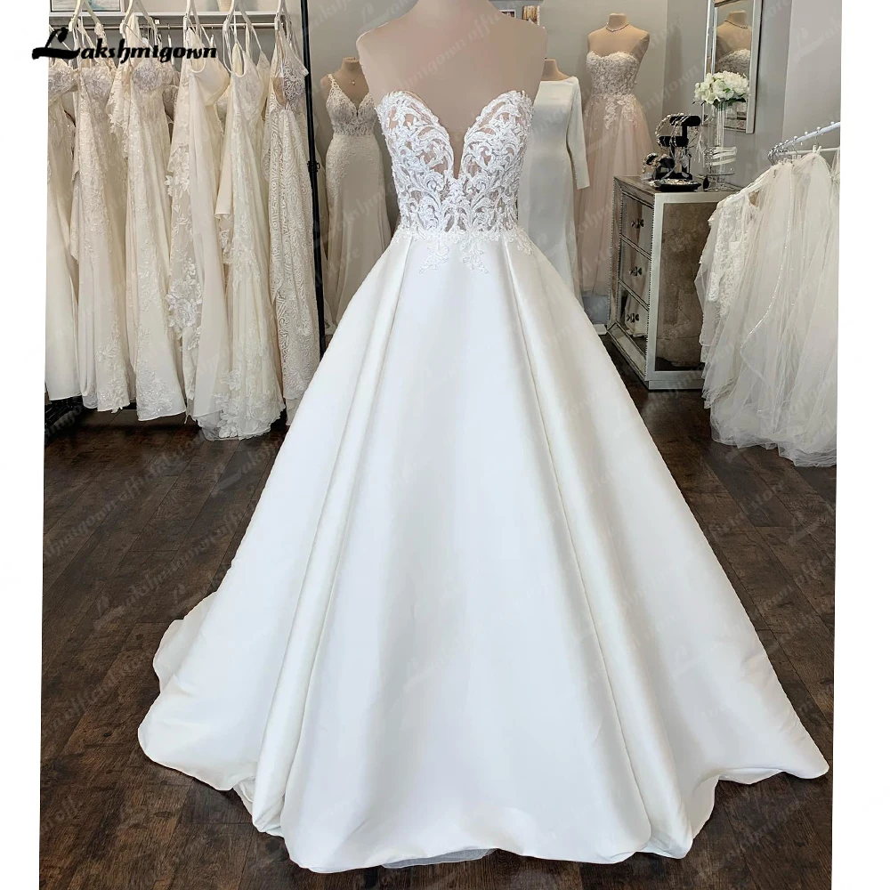 Simple A Line Wedding Dress White Satin Long Beach Bridal Gowns Sleeveless Sweetheart Vestidos de Novia 2023 Summer
Simple A Line Wedding Dress White Satin Long Beach Bridal Gowns Sleeveless Sweetheart Vestidos de Novia 2023 Summer