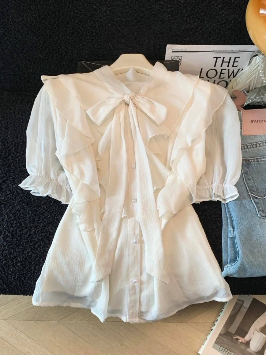 Cherry Blossom Color Bubble Sleeve Chiffon Shirt Women's Summer New Elegance Design Single Button Knot Tie Top
Cherry Blossom Color Bubble Sleeve Chiffon Shirt Women's Summer New Elegance Design Single Button Knot Tie Top