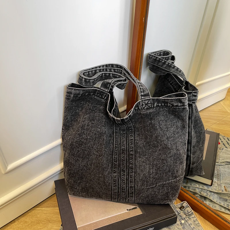 Джинсовые сумки на плечо для поездок на работу, женские сумки с нитками большой вместимости, распродажа, брендовые универсальные простые женские сумки 2025 года
Джинсовые сумки на плечо для поездок на работу, женские сумки с нитками большой вместимости, распродажа, брендовые универсальные простые женские сумки 2025 года