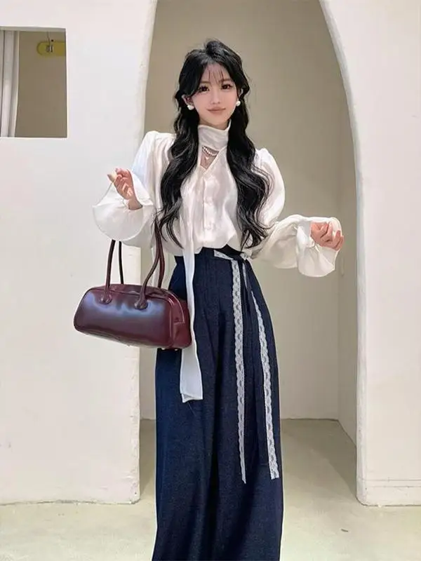 White V-neck Shirt And Blue Wide-leg Pants Two-piece Set Chic Autumn 2025 Fashion Korean Style with Bell Sleeves for Women
White V-neck Shirt And Blue Wide-leg Pants Two-piece Set Chic Autumn 2025 Fashion Korean Style with Bell Sleeves for Women