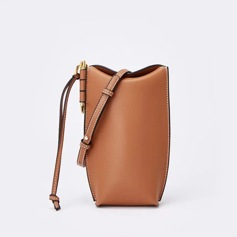 2024 New Mobile Phone European and American Retro Mini Shoulder Messenger Cow Leather Women's Bag
2024 New Mobile Phone European and American Retro Mini Shoulder Messenger Cow Leather Women's Bag