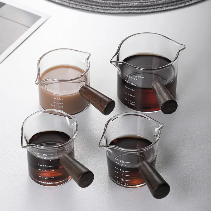 Wooden handle double-mouthed milk coffee milk cup glass coffee milk Italian walnut glass coffee measuring cup
Wooden handle double-mouthed milk coffee milk cup glass coffee milk Italian walnut glass coffee measuring cup