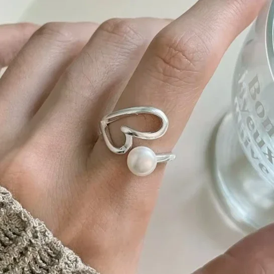 Real 925 Sterling Silver Cute Pearl Hollow Heart Opening Rings for Women Fine Jewelry Minimalist Sweet Cool Accessories
Real 925 Sterling Silver Cute Pearl Hollow Heart Opening Rings for Women Fine Jewelry Minimalist Sweet Cool Accessories