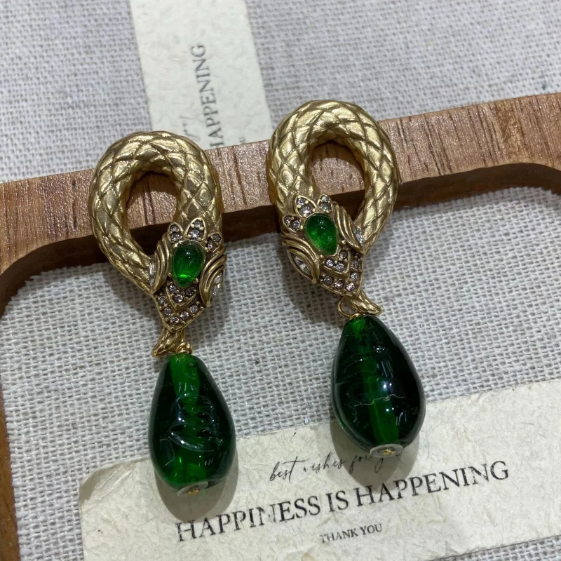 chic Vintage Gold Plated Snake Drop Earrings with Green Teardrop Glass and CZ Accents statement jewelry
chic Vintage Gold Plated Snake Drop Earrings with Green Teardrop Glass and CZ Accents statement jewelry